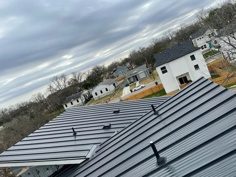 Standing seam metal roof panels with vents for Skylight Repair in Donna